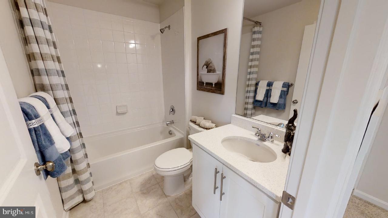 2113 Ruby Turn Bowie, MD 20721 - Photo 29 of 48 a bathroom with a sink toilet and shower