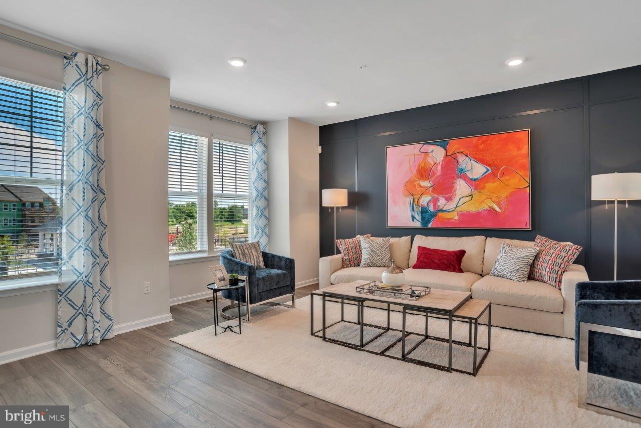 2113 Ruby Turn Bowie, MD 20721 - Photo 3 of 48 a living room with furniture and a flat screen tv