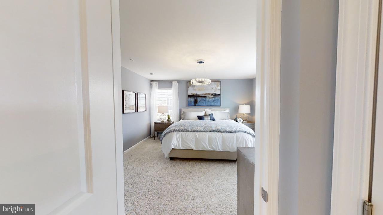 2113 Ruby Turn Bowie, MD 20721 - Photo 33 of 48 a bed room with a bed and a night stand