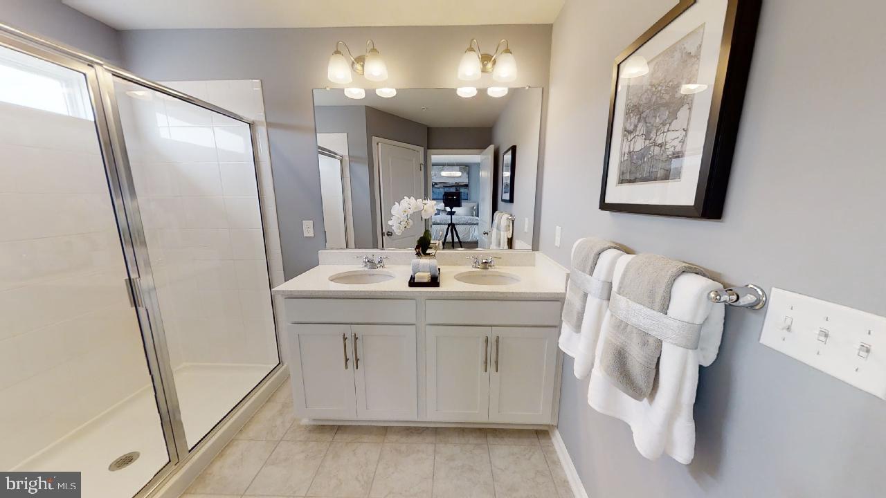 2113 Ruby Turn Bowie, MD 20721 - Photo 34 of 48 a bathroom with a double vanity sink mirror and vanity