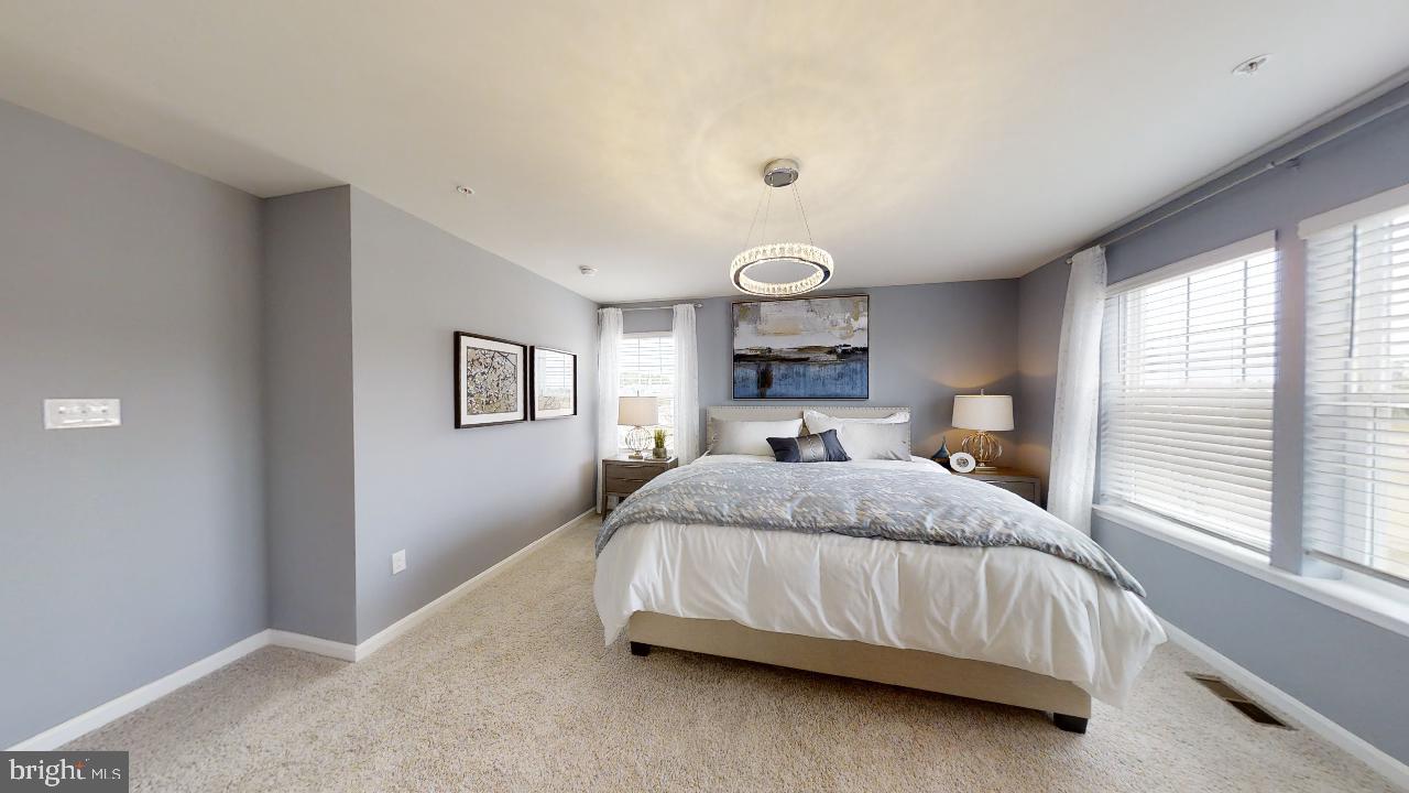 2113 Ruby Turn Bowie, MD 20721 - Photo 37 of 48 a bedroom with a bed and window