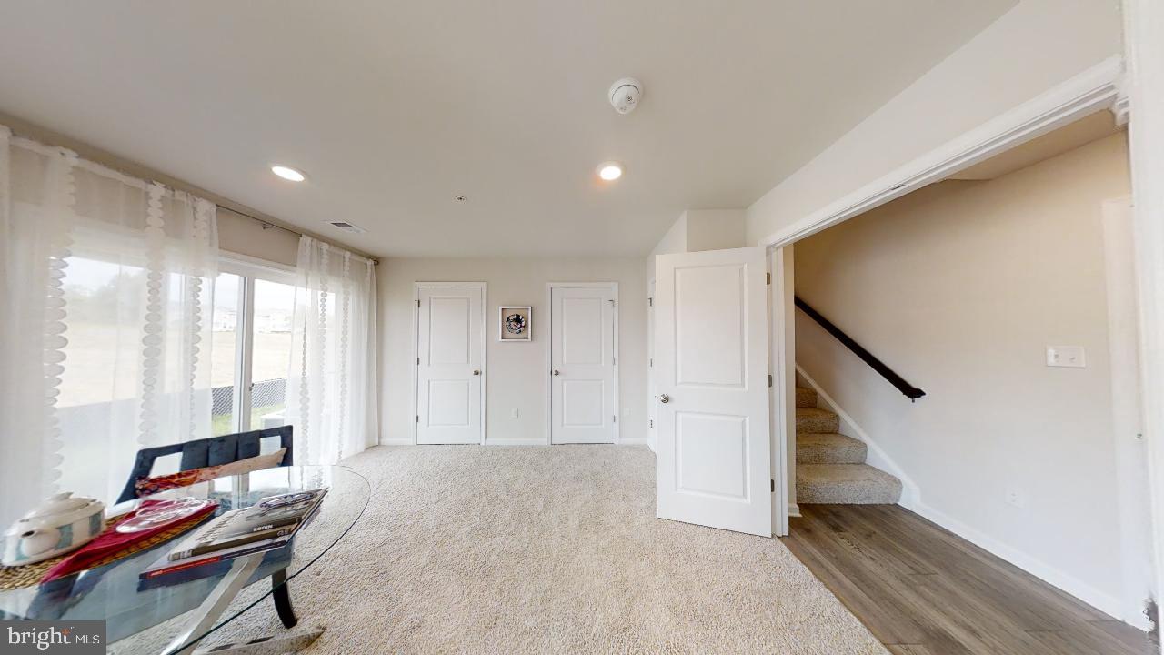 2113 Ruby Turn Bowie, MD 20721 - Photo 38 of 48 a view of room with furniture and a window