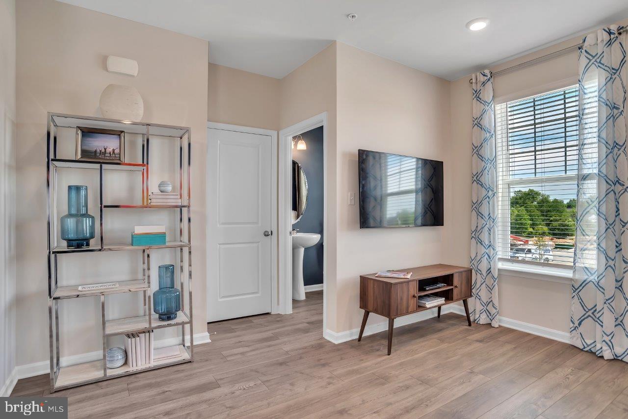 2113 Ruby Turn Bowie, MD 20721 - Photo 4 of 48 a living room with furniture and a flat screen tv