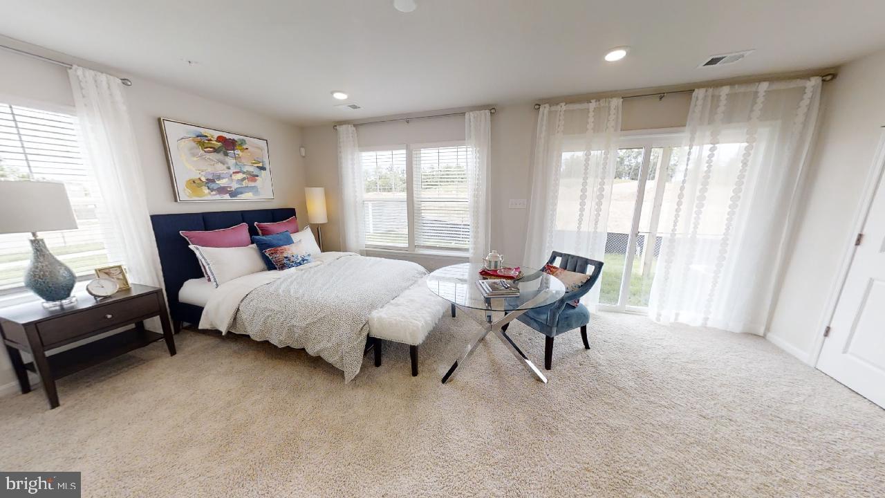 2113 Ruby Turn Bowie, MD 20721 - Photo 43 of 48 a bed room with a bed and a chair