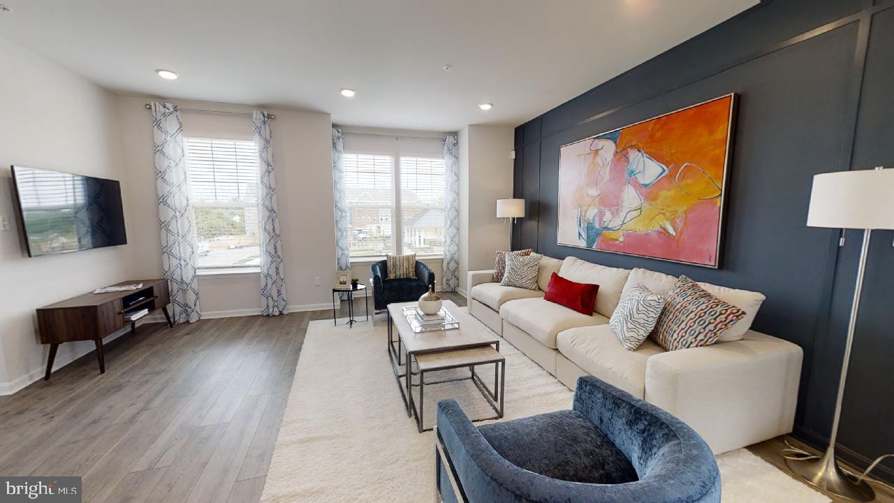 2113 Ruby Turn Bowie, MD 20721 - Photo 46 of 48 a living room with furniture and a flat screen tv