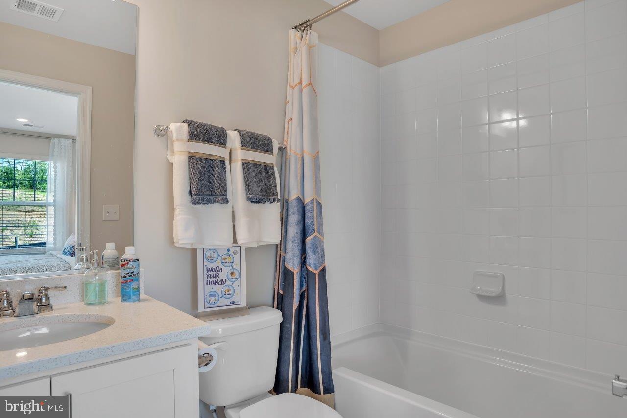 2113 Ruby Turn Bowie, MD 20721 - Photo 5 of 48 a bathroom with a sink toilet and shower