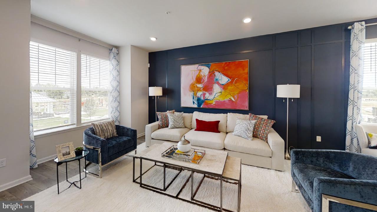 2113 Ruby Turn Bowie, MD 20721 - Photo 10 of 48 a living room with furniture and a flat screen tv