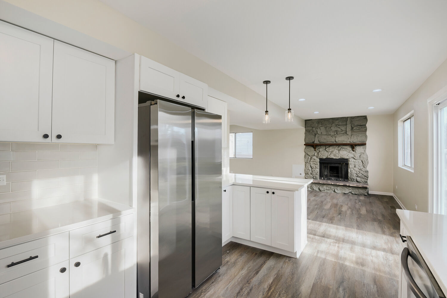 141 Timberlane Road Matteson, IL 60443 - Photo 11 of 27 a large kitchen with a fireplace in it