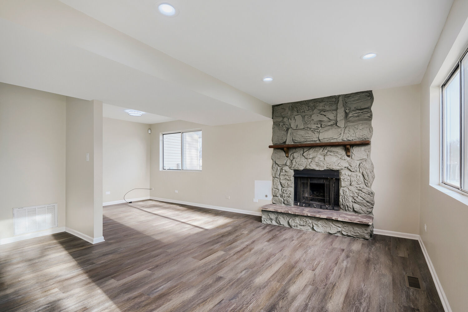 141 Timberlane Road Matteson, IL 60443 - Photo 12 of 27 a view of an empty room with wooden floor and a window