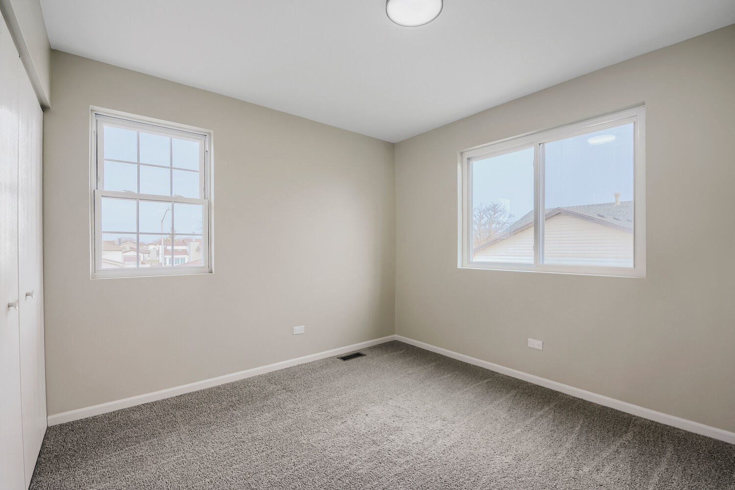 141 Timberlane Road Matteson, IL 60443 - Photo 19 of 27 an empty room with windows
