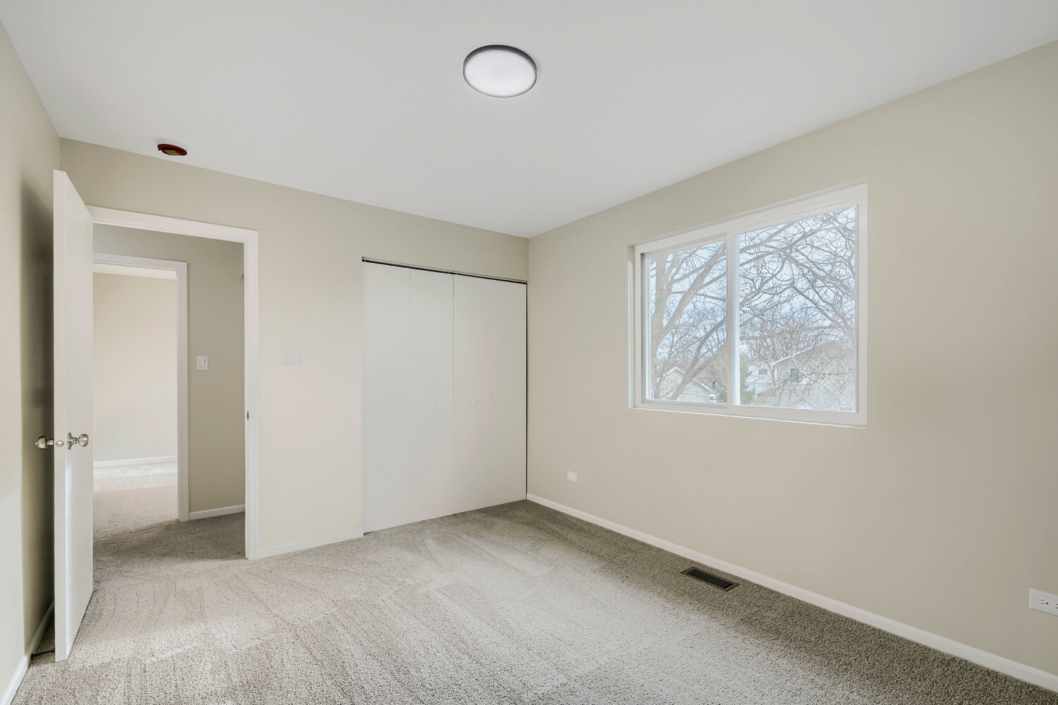 141 Timberlane Road Matteson, IL 60443 - Photo 22 of 27 a view of an empty room with a window