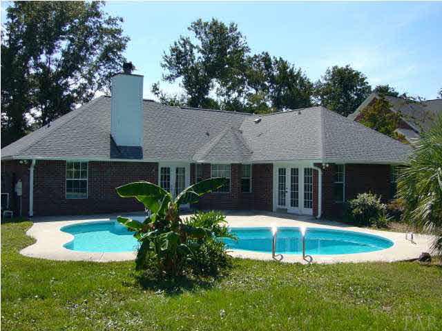 5025 Roland Road Pace, FL 32571 - Photo 2 of 11 Pool, Patio, rear view