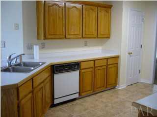 5025 Roland Road Pace, FL 32571 - Photo 6 of 11 pantry side of kitchen