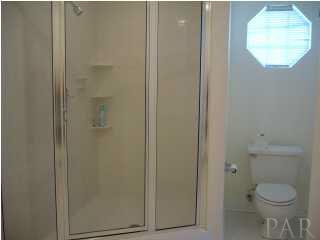 5025 Roland Road Pace, FL 32571 - Photo 9 of 11 Master Bath, Jetted tub seperate, dual vanities between bath and walk in closet.