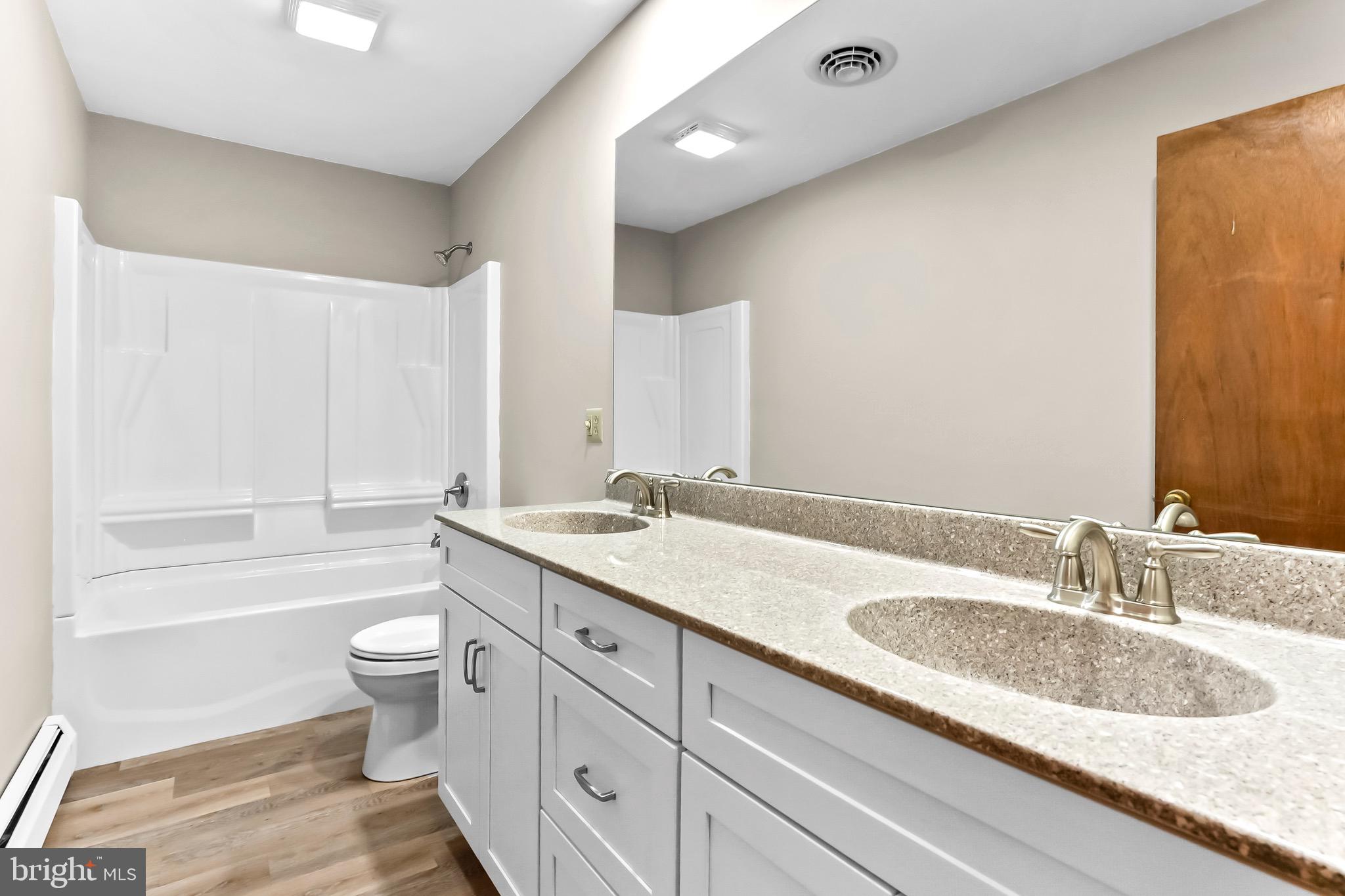 350 Roneys Corner Road Oxford, PA 19363 - Photo 15 of 18 a bathroom with a granite countertop sink toilet and shower