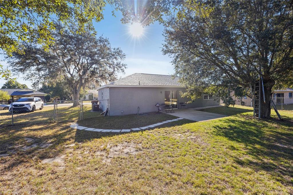 2 Oak Court Pass Ocala, FL 34472 - Photo 19 of 28 a view of a house with a yard