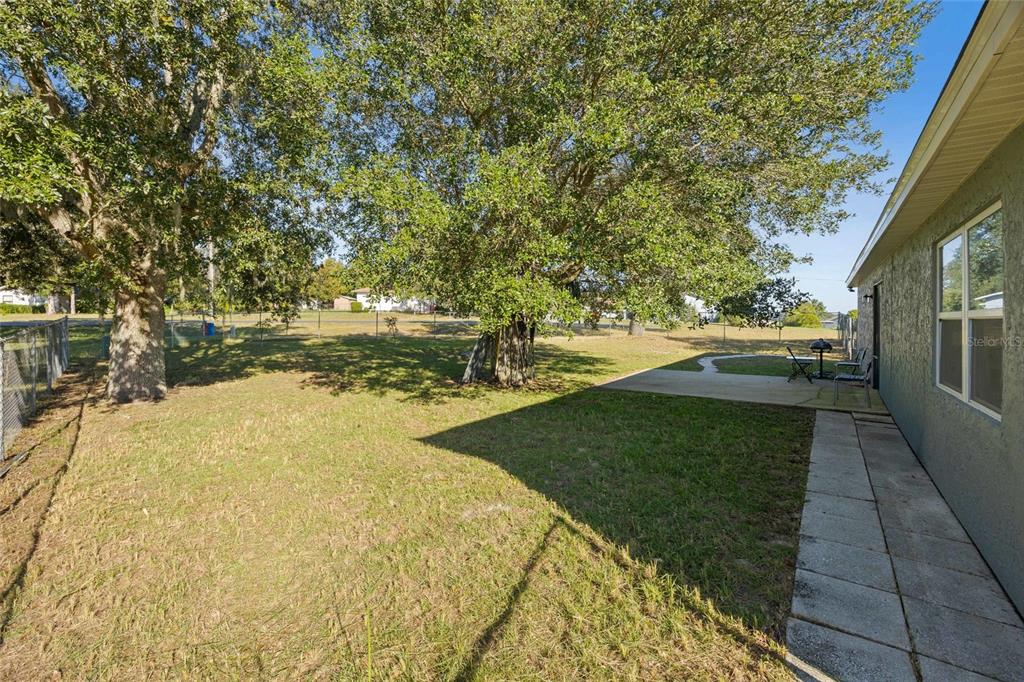 2 Oak Court Pass Ocala, FL 34472 - Photo 20 of 28 a view of a yard with an outdoor space