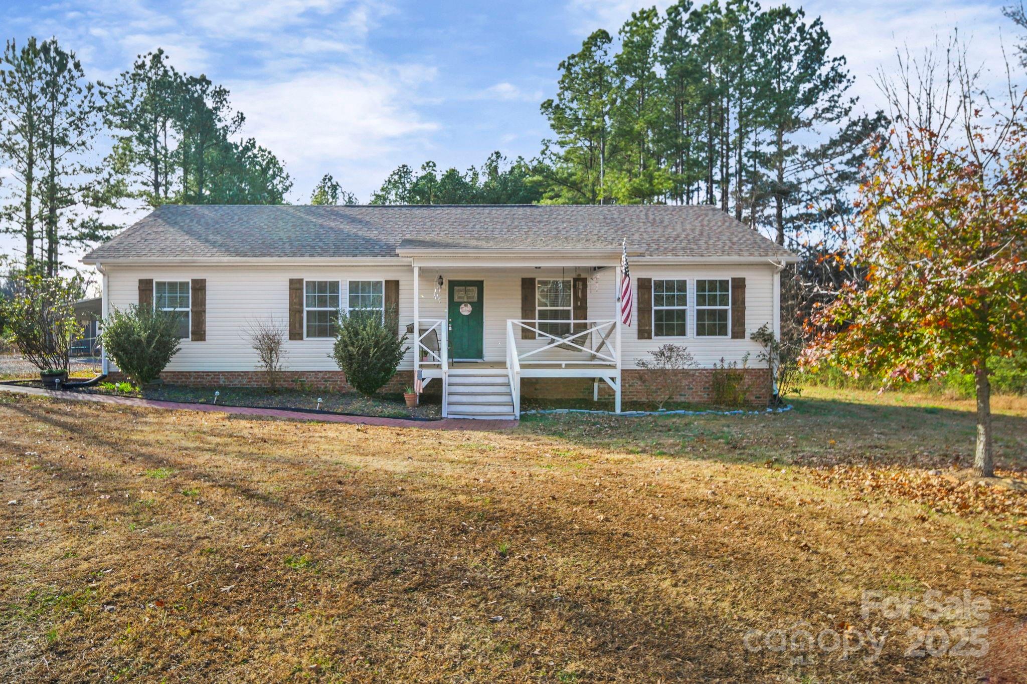 30291 C Red Hill Road Albemarle, NC 28001 - Photo 2 of 45 front view of a house with a yard