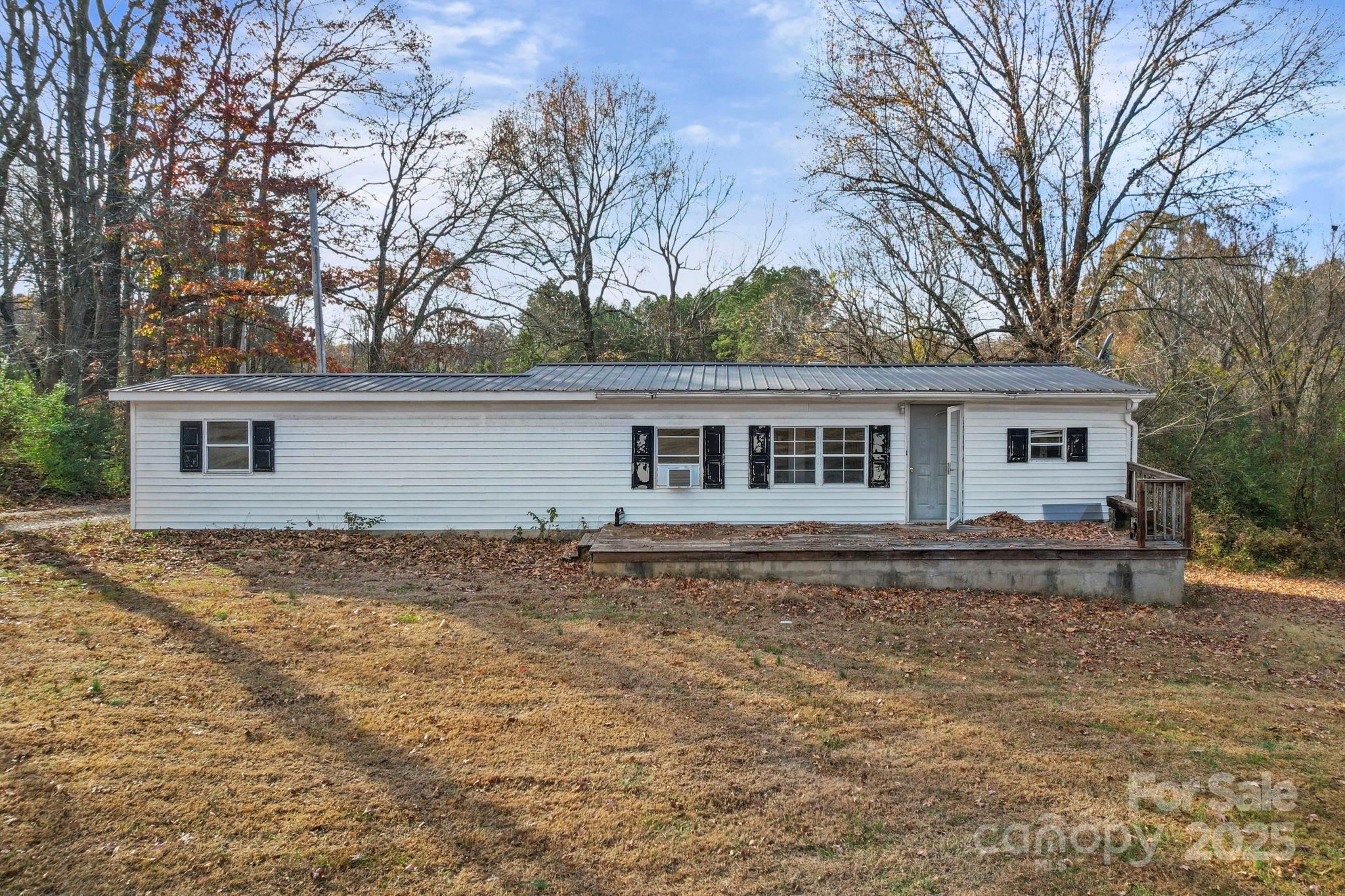 30291 C Red Hill Road Albemarle, NC 28001 - Photo 36 of 45 front view of a house with a yard