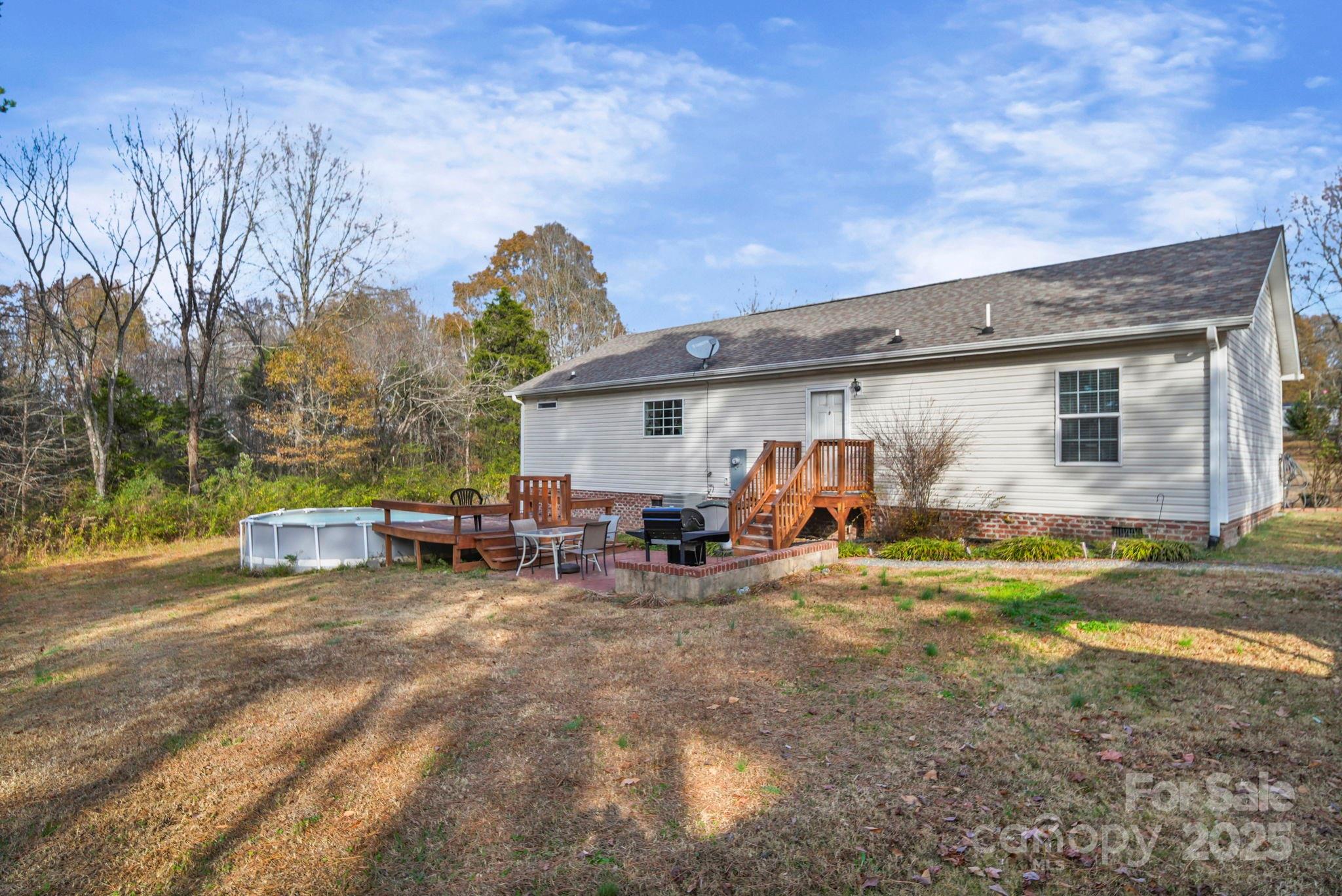 30291 C Red Hill Road Albemarle, NC 28001 - Photo 7 of 45 a view of a house with backyard