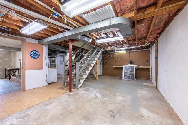 a view of an empty room with storage