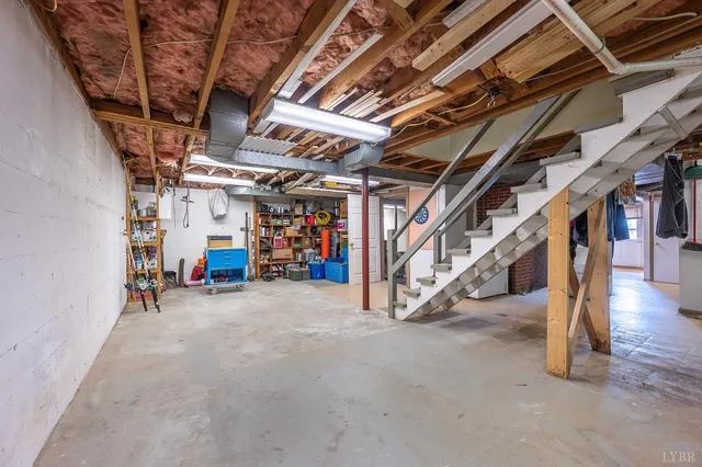 a view of an empty room with wooden roof