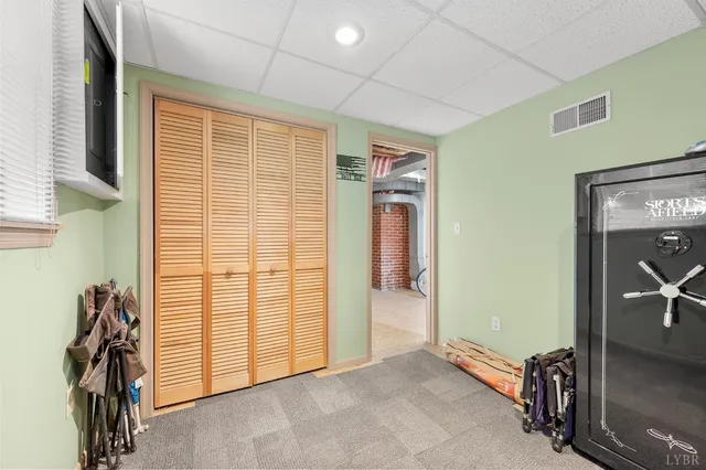 a view of empty room with windows