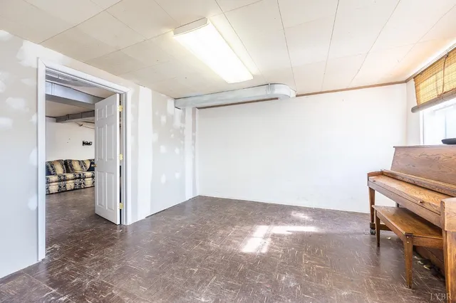a view of livingroom with hardwood floor and a ceiling fan