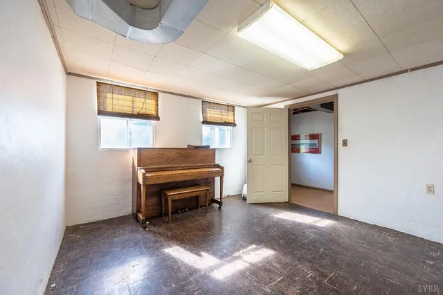 a room with furniture and a window