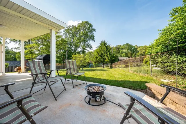 a view of a swimming pool with a lounge chairs