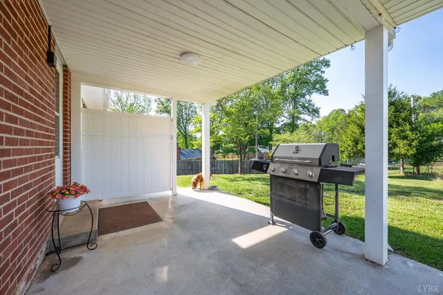 a view of a room with furniture and garden