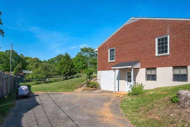 a house view with a garden space