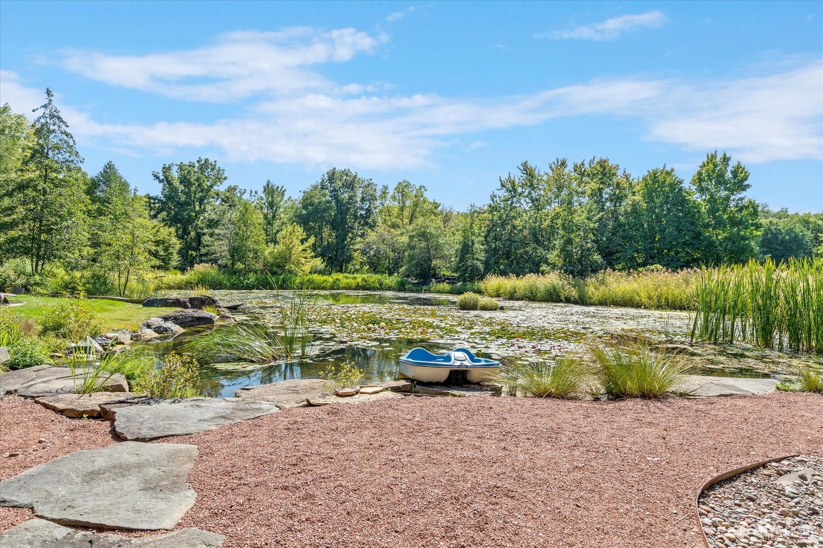 6N235 Surrey Road Wayne, IL 60184 - Photo 51 of 66 a view of a lake with a yard