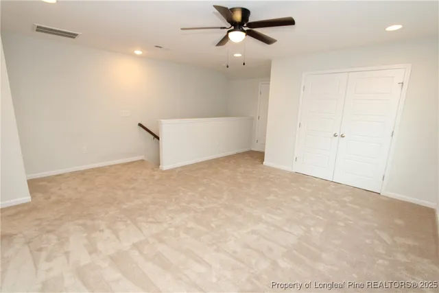 a backyard of a house with large trees