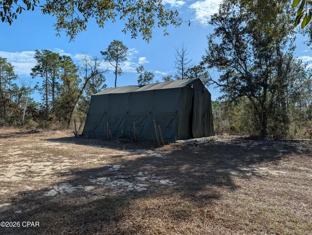 $525,000 | 13920 East Woodland Road, Southport, FL 32409