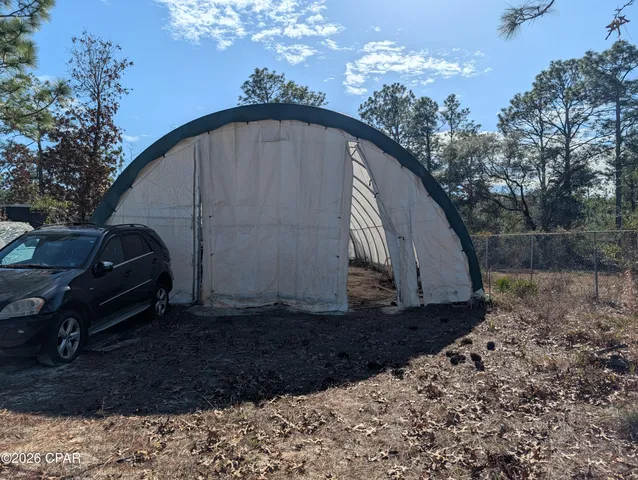 $525,000 | 13920 East Woodland Road, Southport, FL 32409