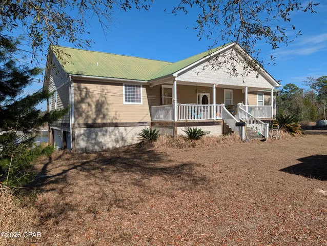 $525,000 | 13920 East Woodland Road, Southport, FL 32409