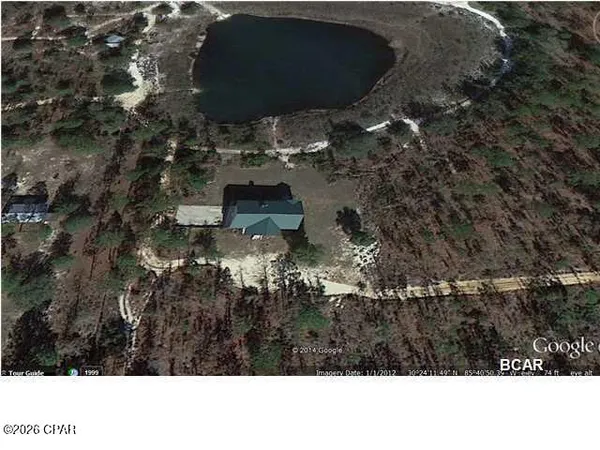 $469,000 | 13920 East Woodland Road, Southport, FL 32409