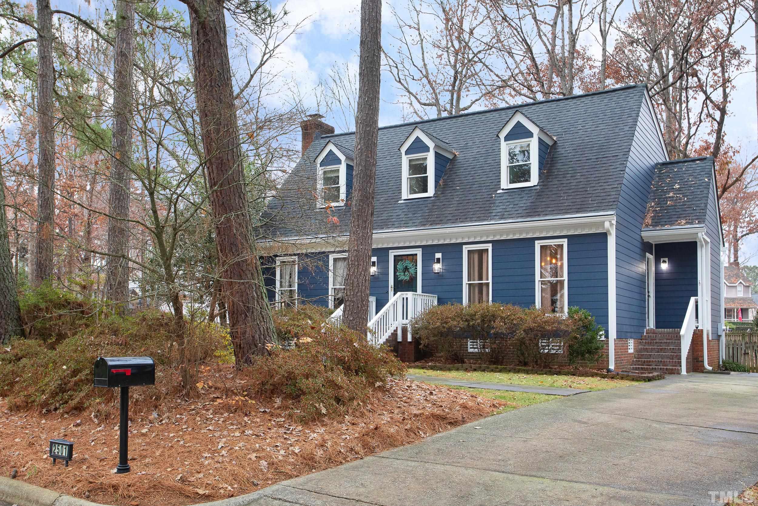 2501 Diamondhitch Trail Raleigh, NC 27615 - Photo 1 of 21 a front view of a house with garden