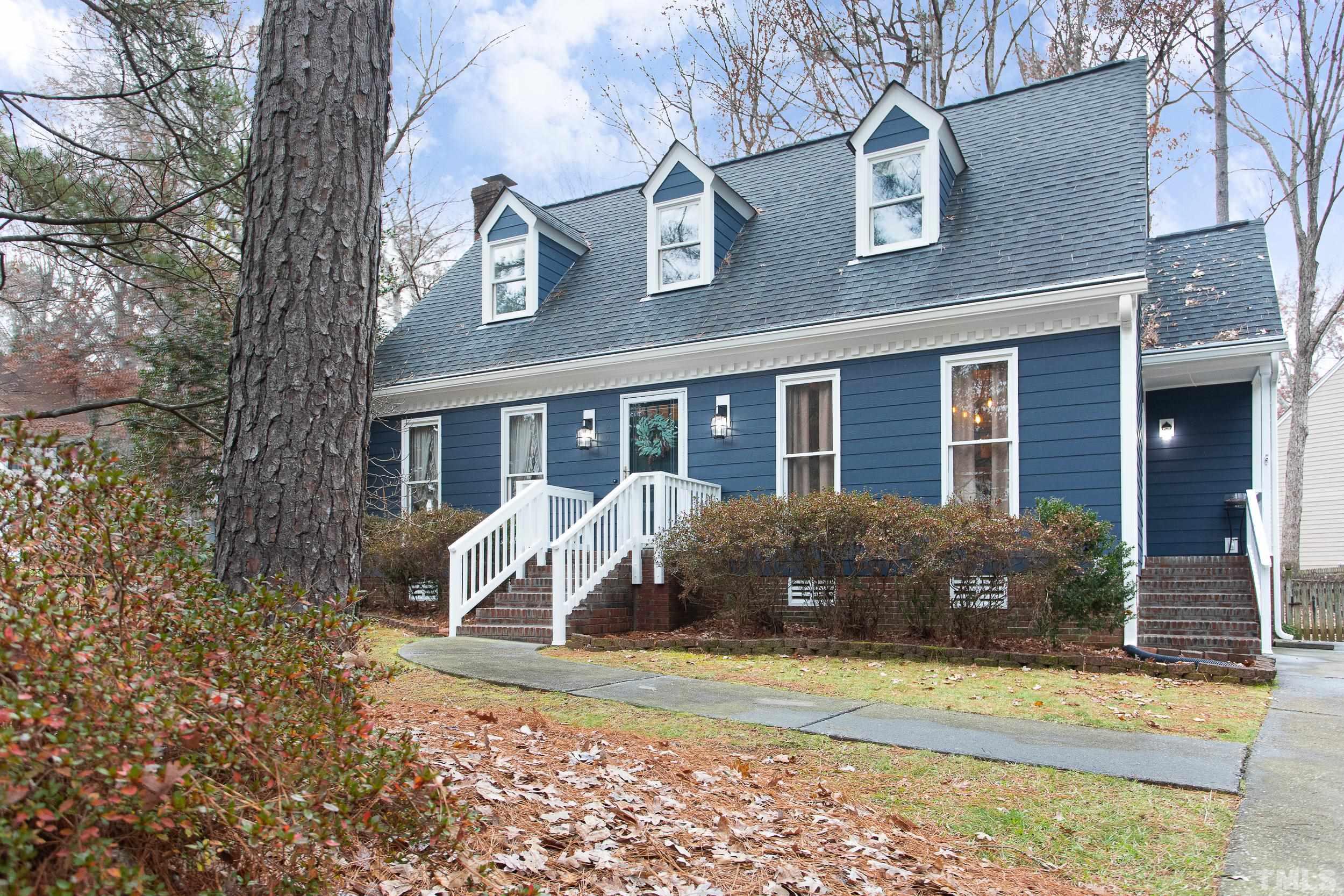 2501 Diamondhitch Trail Raleigh, NC 27615 - Photo 2 of 21 a front view of a house with garden