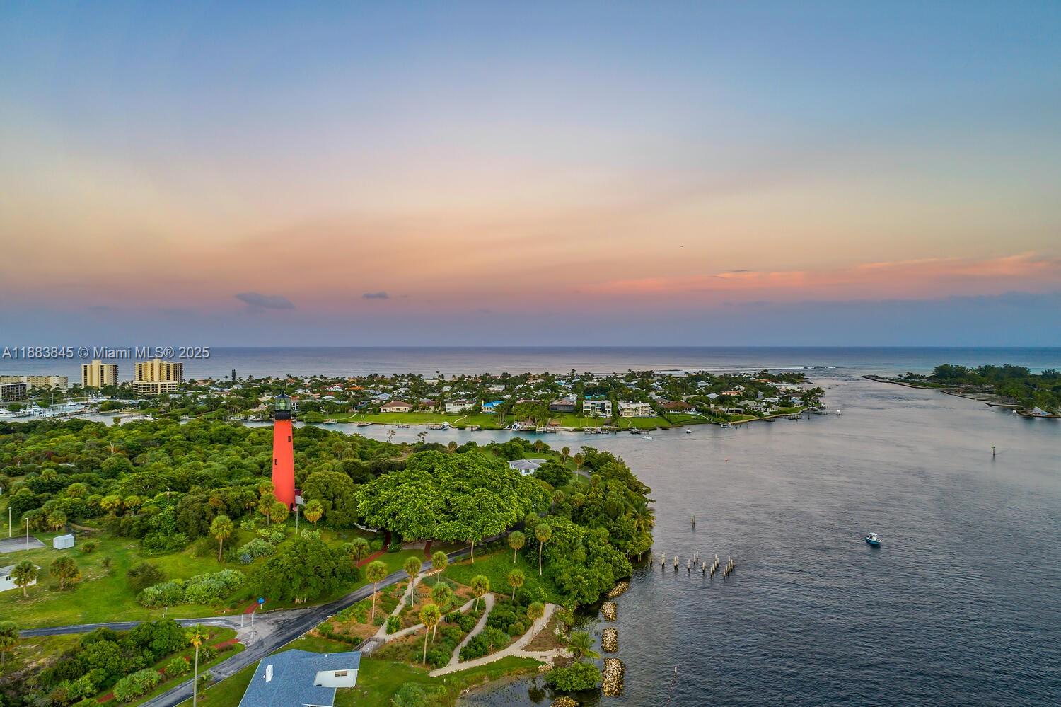 200 Ocean Trail Way, Unit 701 Jupiter, FL 33477 - Photo 26 of 27 an aerial view of a house and a yard