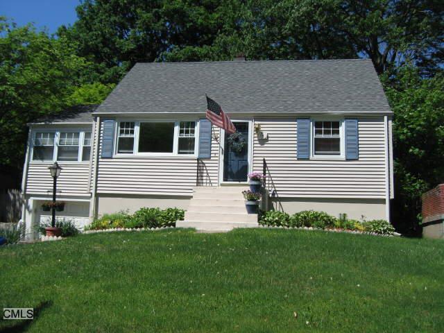 104 Spring Hill Avenue Norwalk, CT 06850 - Photo 1 of 1 a aerial view of a house next to a yard