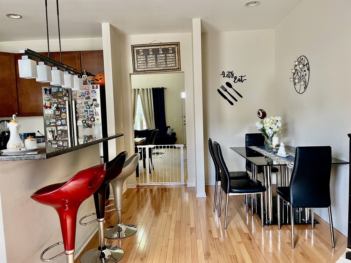2018 Shermer Road, Unit 2018 Glenview, IL 60026 - Photo 9 of 39 a view of a dining room with furniture and wooden floor
