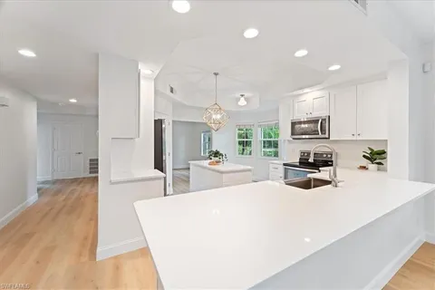 $435,000 | 2868 Aintree Lane, Unit M101, Naples, FL 34112