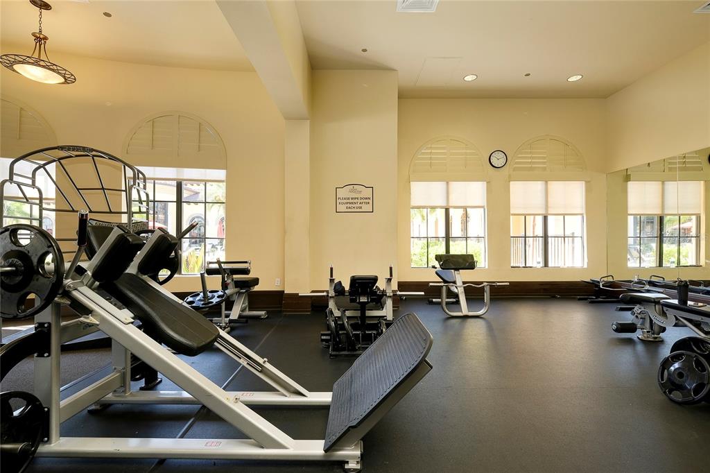 20100 Ragazza Circle, Unit 101 Venice, FL 34293 - Photo 71 of 100 a room with gym equipment and a large window