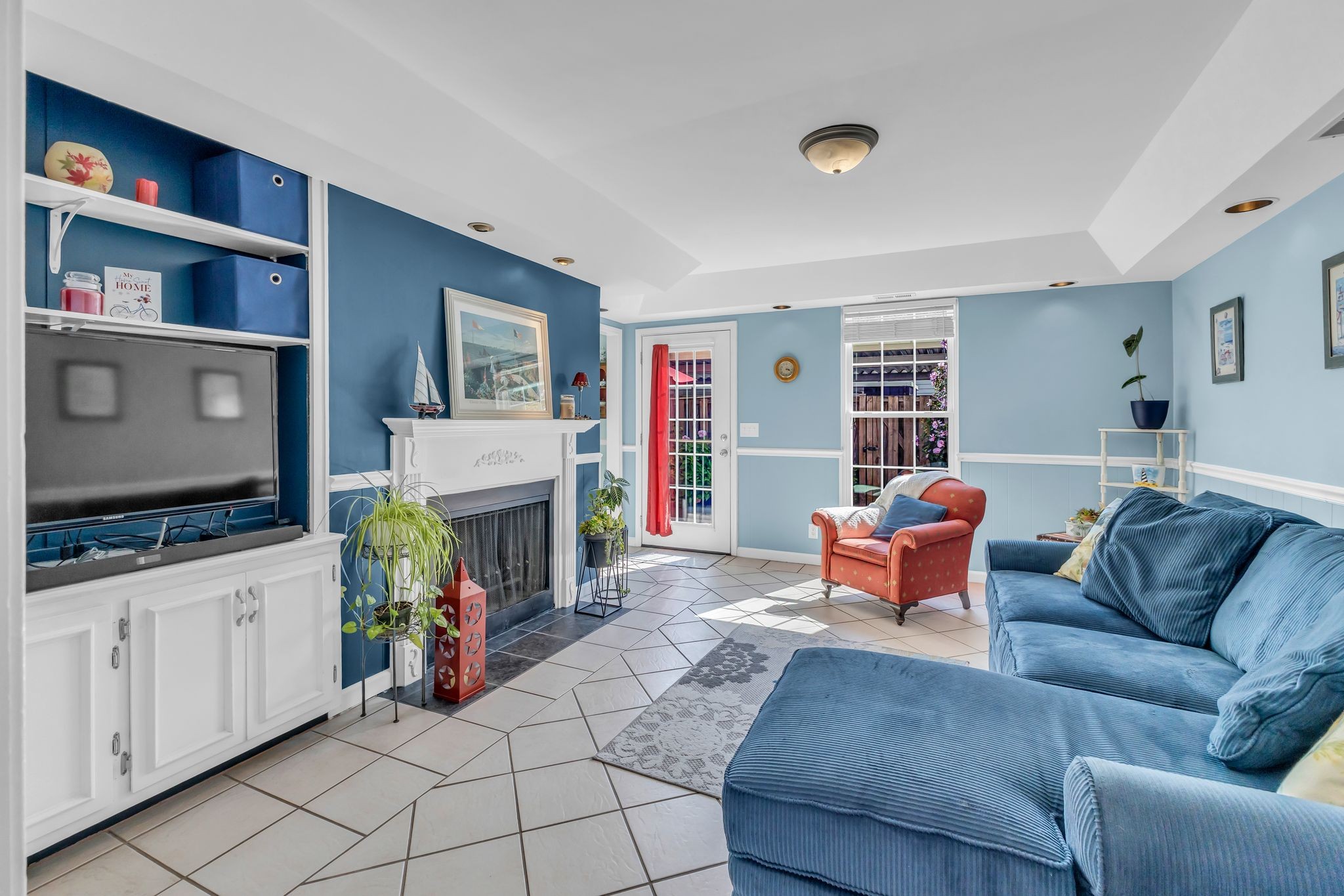 824 General George Patton Road Nashville, TN 37221 - Photo 12 of 35 a living room with furniture and a flat screen tv