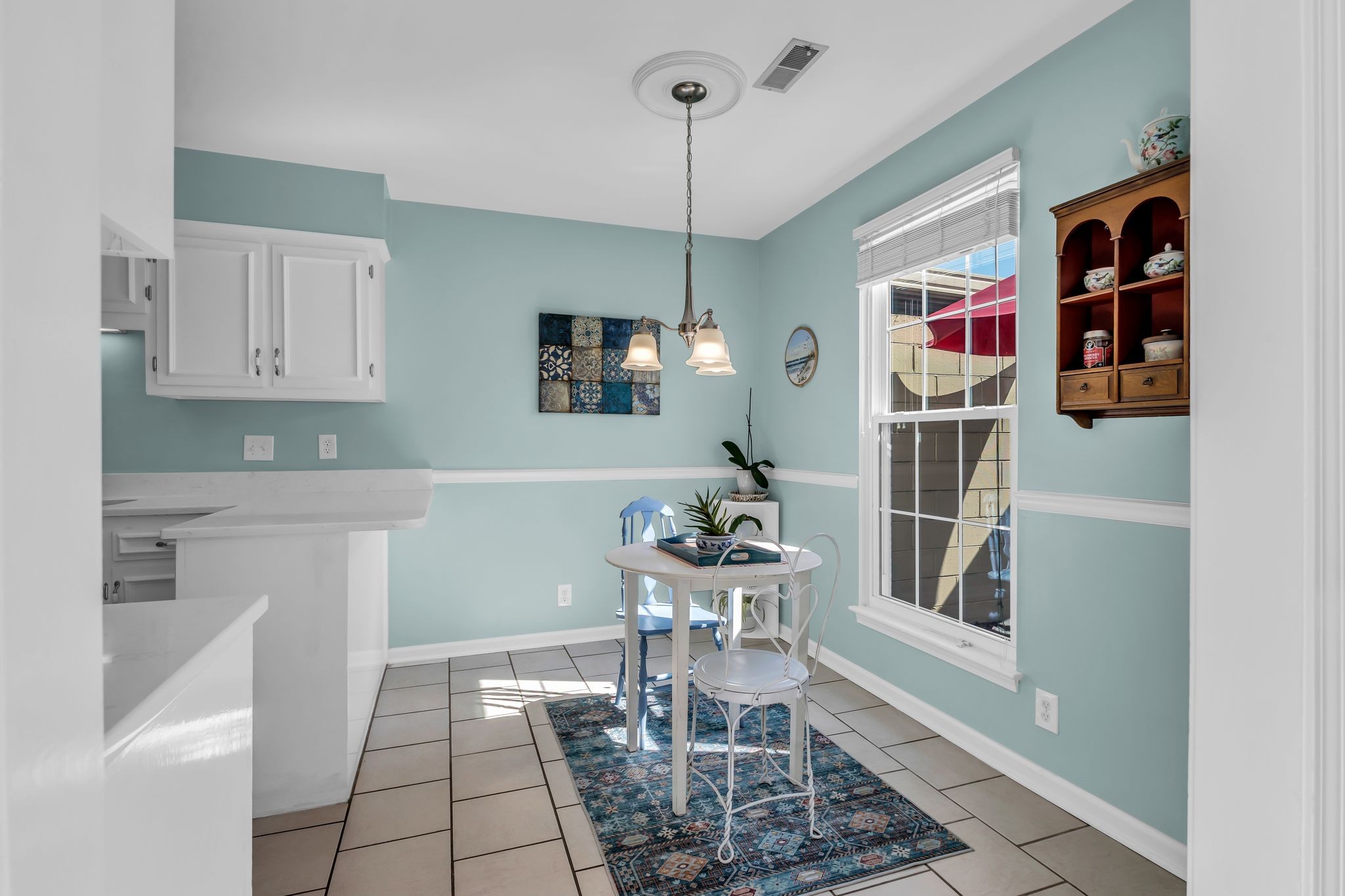 824 General George Patton Road Nashville, TN 37221 - Photo 15 of 35 a kitchen with stainless steel appliances a dining table chairs and a refrigerator