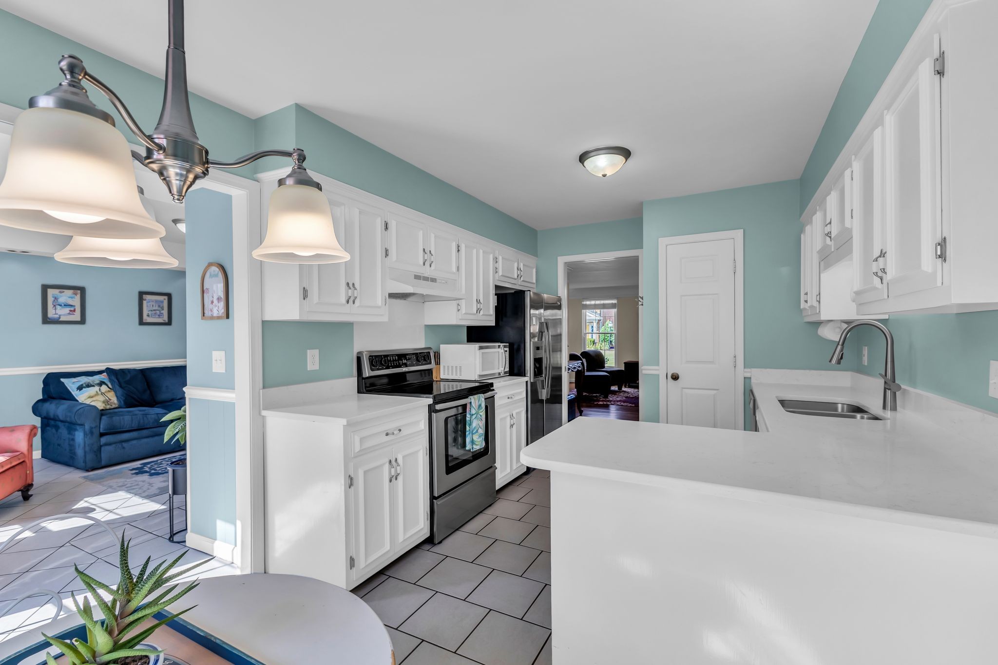 824 General George Patton Road Nashville, TN 37221 - Photo 16 of 35 a kitchen with stainless steel appliances a stove sink and refrigerator