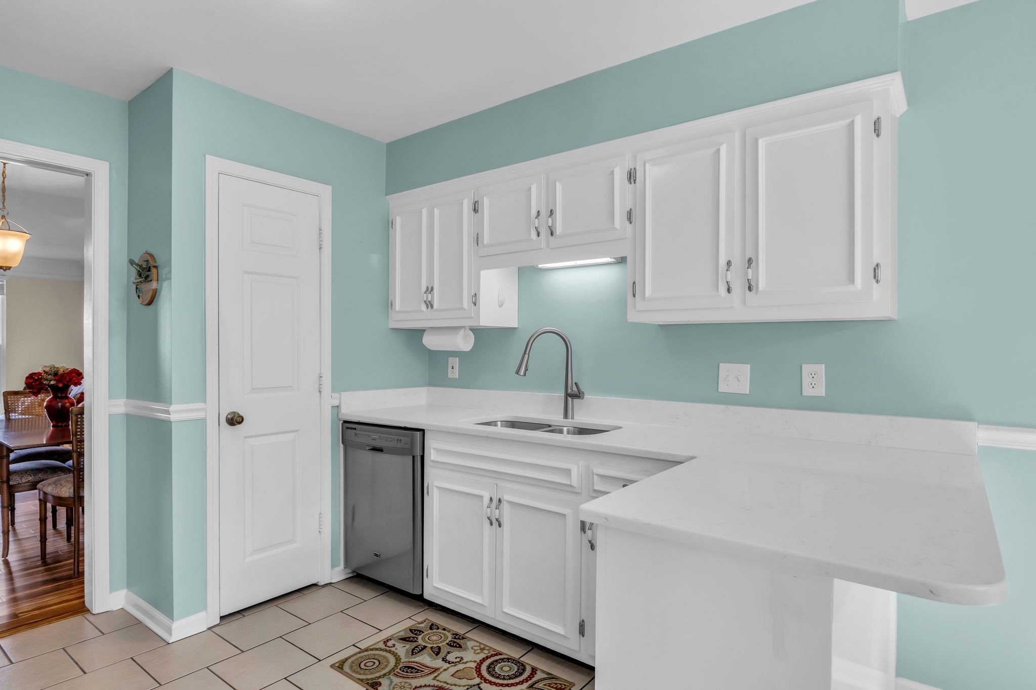 824 General George Patton Road Nashville, TN 37221 - Photo 18 of 35 a kitchen with stainless steel appliances granite countertop a sink dishwasher and a refrigerator with wooden cabinets