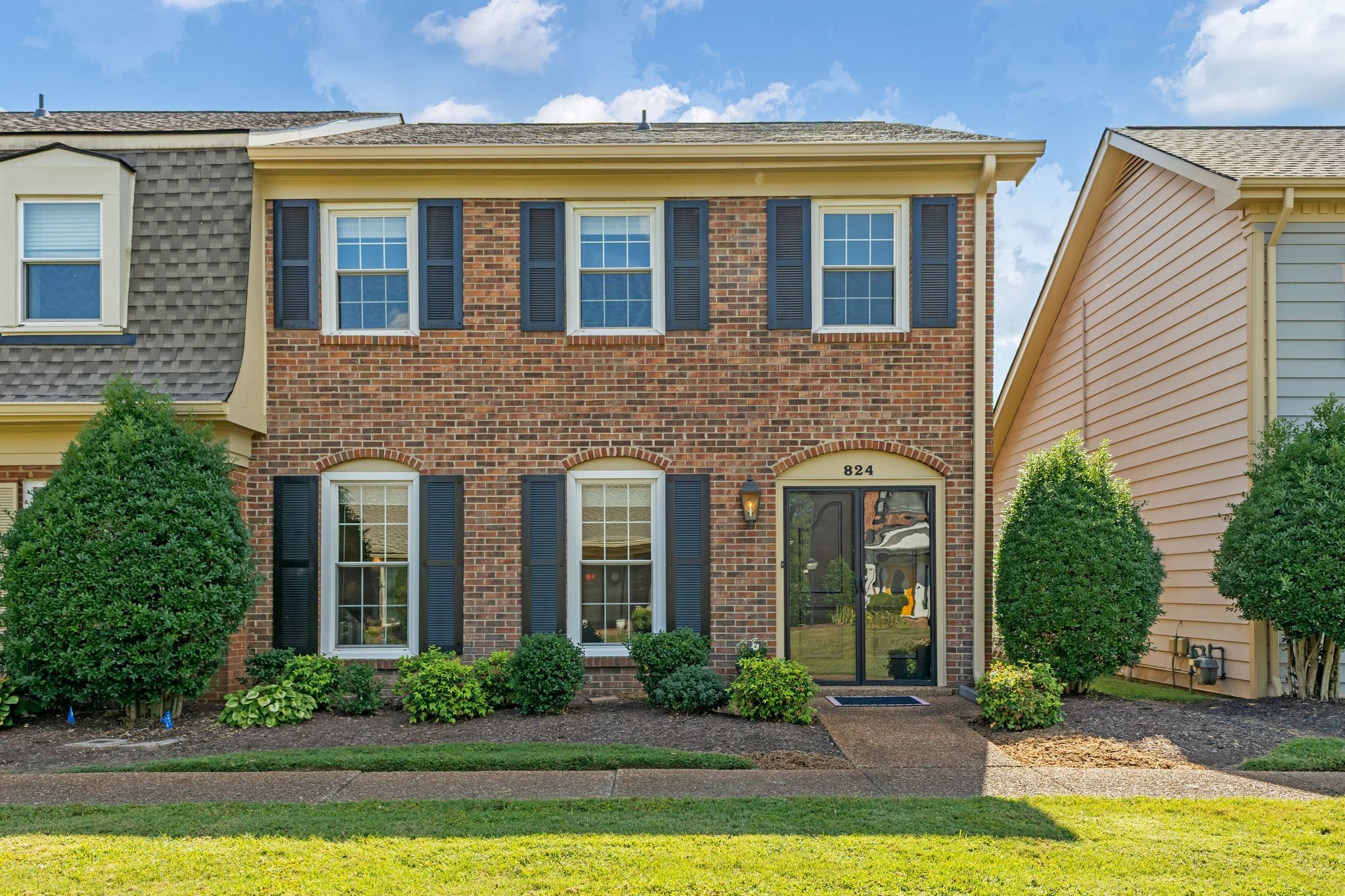 824 General George Patton Road Nashville, TN 37221 - Photo 2 of 35 a front view of a house with yard and furniture